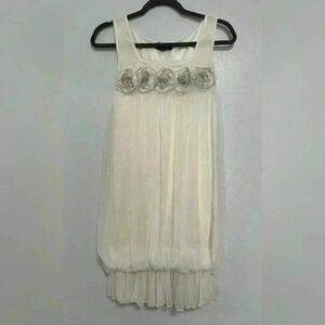 Elegant White Sleeveless Dress with Floral Accents